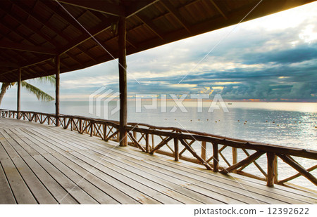wood terrace in wooden pavillion against peaceful of heaven sea 12392622