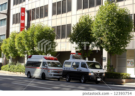 Police car and ambulance waiting for traffic accident site Police car and ambulance waiting for traffic accident site 12393754