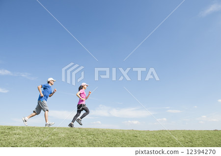 Men and women running Men and women running 12394270