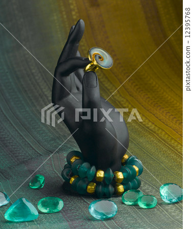 bracelet and luxury ring on hand stand 12395768