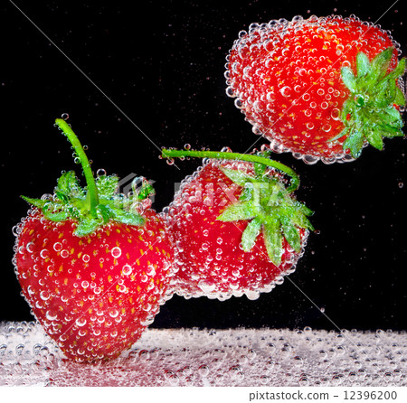 Strawberry in soda water Strawberry in soda water 12396200