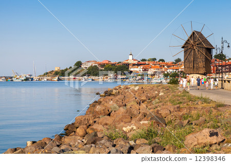 Coastal landscape with old windmill. Ancient town Nessebar Coastal landscape with old windmill. Ancient town Nessebar 12398346