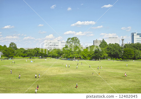 People who play in the park and the blue sky People who play in the park and the blue sky 12402045
