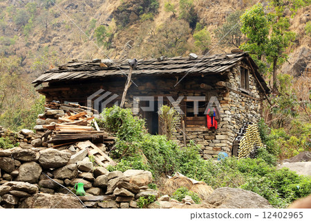 Stone house in the mountains of the Himalayas. Everest region, H Stone house in the mountains of the Himalayas. Everest region, H 12402965