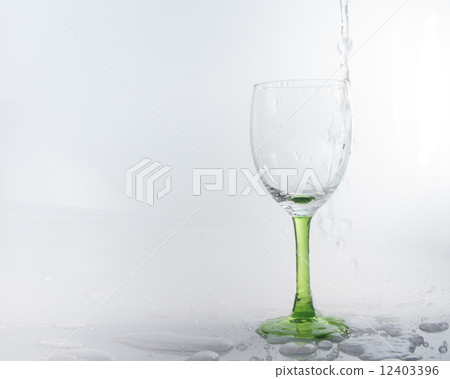 water splashing in a wineglass 12403396