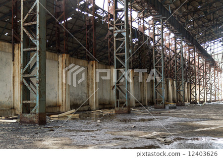 Blue steel pillar inside abandoned warehouse Blue steel pillar inside abandoned warehouse 12403626