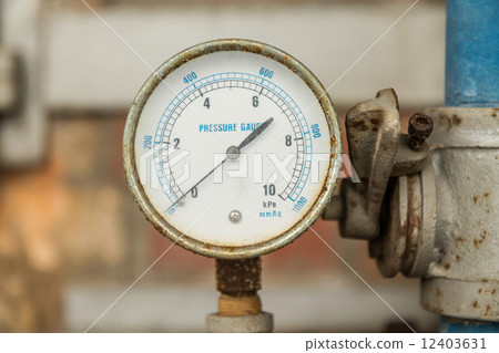 Pressure Gauge connected to Pipes 12403631