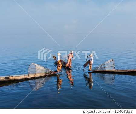 Burmese fisherman at Inle lake, Myanmar Burmese fisherman at Inle lake, Myanmar 12408338