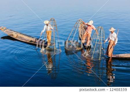 Burmese fisherman at Inle lake, Myanmar Burmese fisherman at Inle lake, Myanmar 12408339