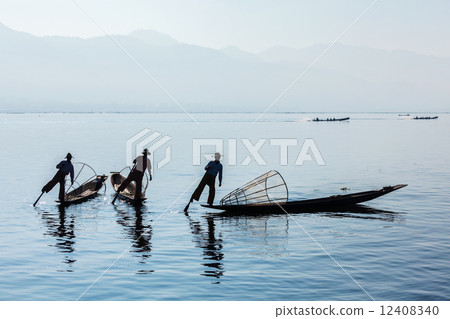 Burmese fisherman at Inle lake, Myanmar Burmese fisherman at Inle lake, Myanmar 12408340