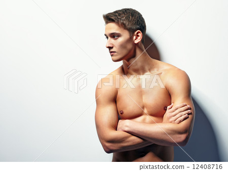 Portrait of muscular young man Portrait of muscular young man 12408716
