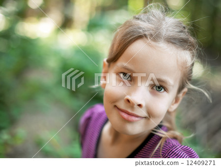 Smiling cute little girl Smiling cute little girl 12409271
