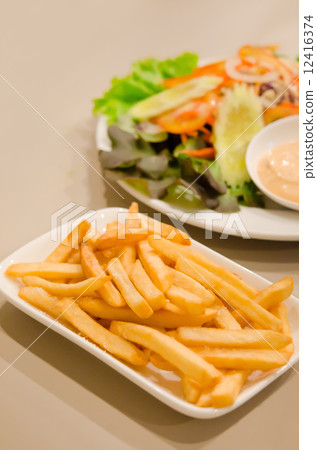 french fries  and salad 12416374