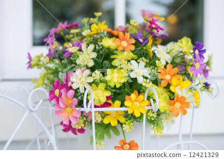 Fake flowers in the vase on a bicycle Fake flowers in the vase on a bicycle 12421329