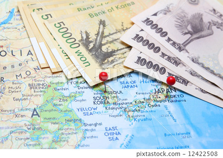 South Korean Won and Japanese Yen with pin on map 12422508