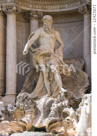 Statue of Neptune at the Trevi Fountain in Rome, Italy 12423871