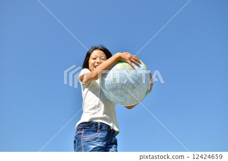 A girl holding the earth 12424659