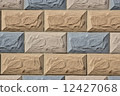 Decorative wall covered with colourful tiles 12427068