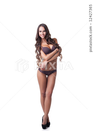 Smiling leggy model advertises erotic underwear Smiling leggy model advertises erotic underwear 12427365