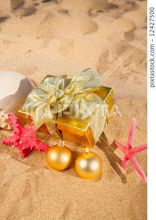 christmas gifts on beach 12427500
