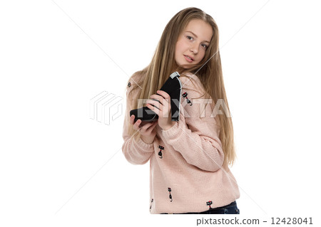 Image of teenage girl with the shoe Image of teenage girl with the shoe 12428041