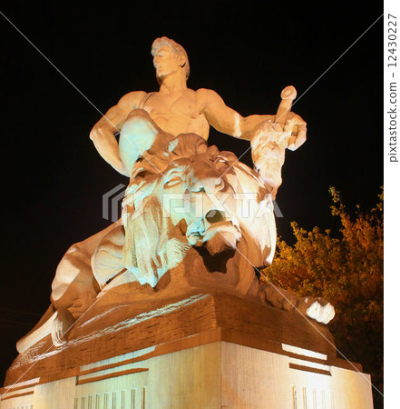 Man defeating lion   12430227