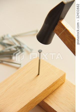 Hit a nail Hit a nail 12431682