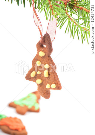 Gingerbread cookie on christmas tree Gingerbread cookie on christmas tree 12434732