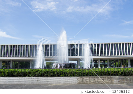 View of the Hiroshima Peace Memorial Museum with a fountain 12436312