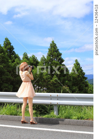 Blue sky and camera girls 12436418