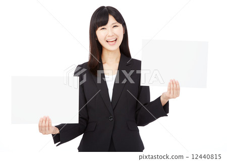 Business woman who laughs with two message boards Business woman who laughs with two message boards 12440815