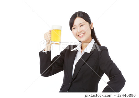 Business woman with beer mug Business woman with beer mug 12440896
