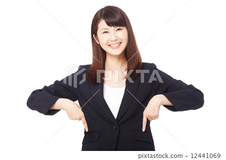 Pointing business woman 12441069