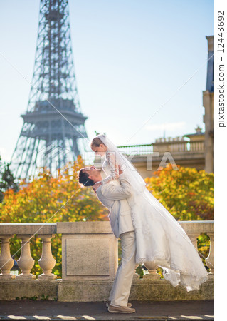 Happy just married couple in Paris 12443692