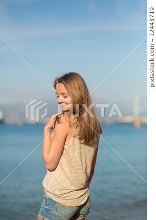 Young girl on the beach in Cannes 12443719
