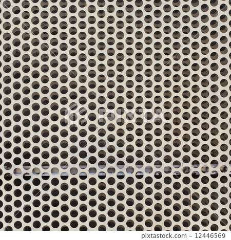 Background of white steel metal with circle perforated holes 12446569