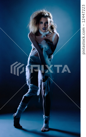 Beautiful slim girl posing dressed as mummy Beautiful slim girl posing dressed as mummy 12447223