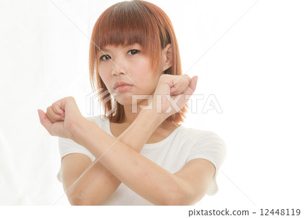 bright picture of young Asian woman making stop gesture 12448119