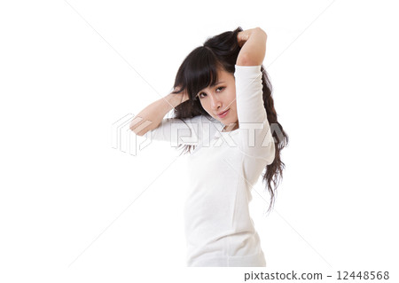 Chinese female with hands in hair Chinese female with hands in hair 12448568