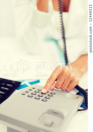 businesswoman with phone calling 12449315