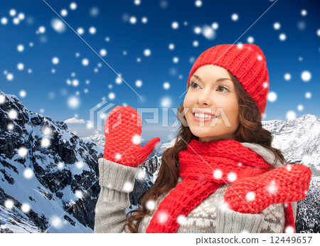 smiling young woman in winter clothes smiling young woman in winter clothes 12449657