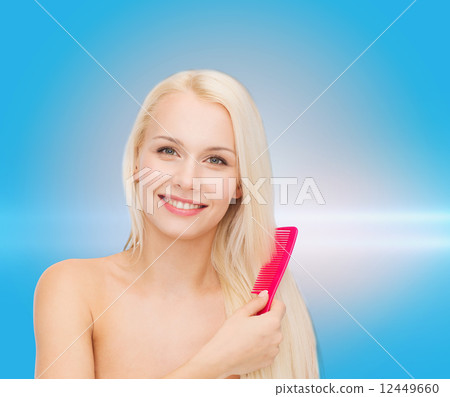 smiling woman with hair brush smiling woman with hair brush 12449660