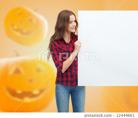 smiling teenage girl with white board 12449661