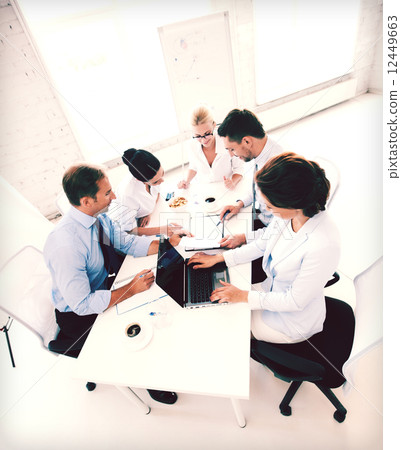 business team having meeting in office business team having meeting in office 12449663