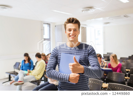 group of smiling students in lecture hall group of smiling students in lecture hall 12449860