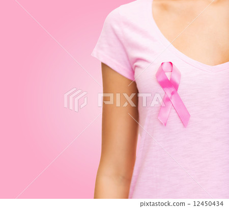 close up of woman with cancer awareness ribbon 12450434