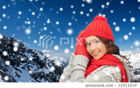 smiling young woman in winter clothes smiling young woman in winter clothes 12451619