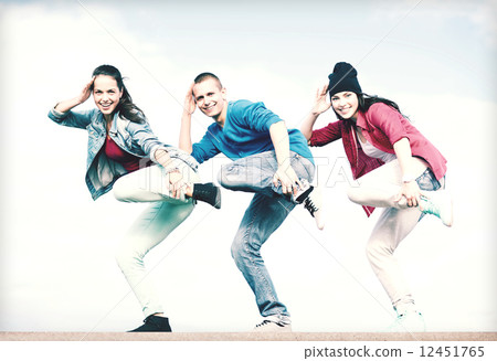 group of teenagers dancing group of teenagers dancing 12451765