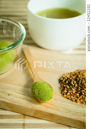 powdered green tea on bamboo napkin texture powdered green tea on bamboo napkin texture 12452281