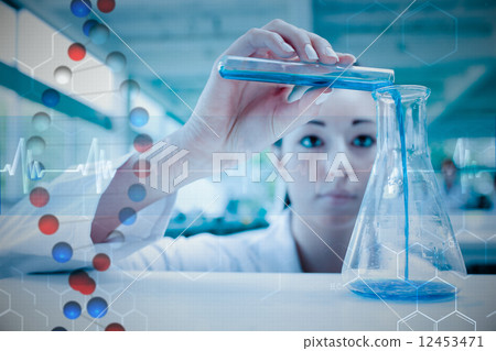 Composite image of scientist pouring a liquid in an erlenmeyer f 12453471